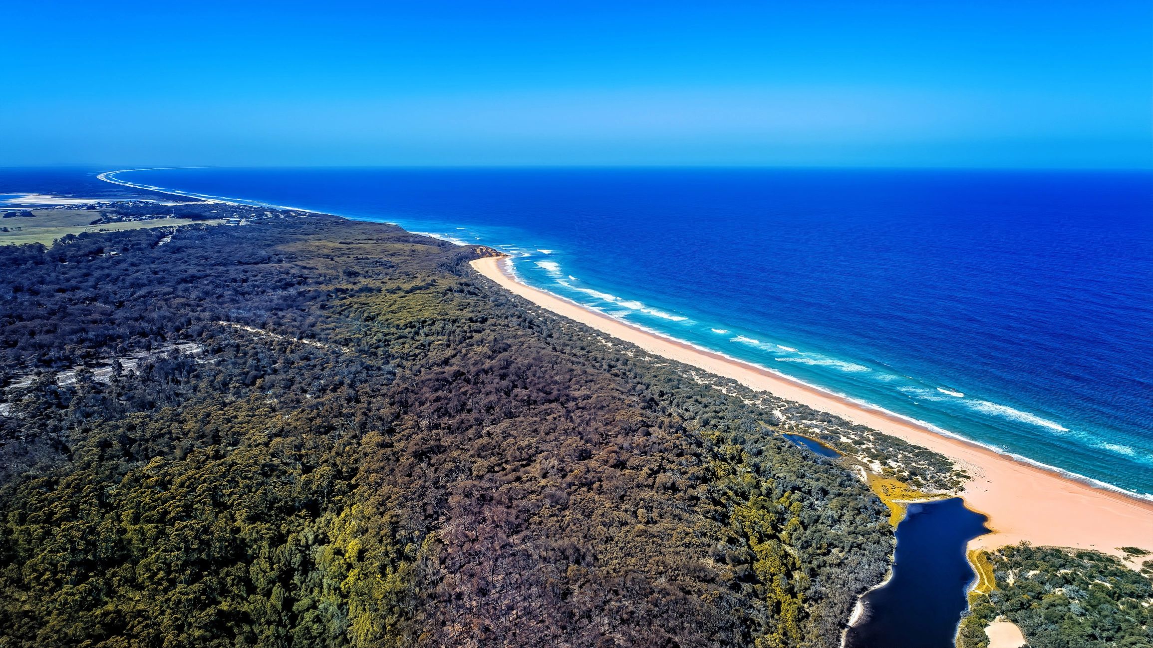 Aerial view of a lake and coastline in Australia